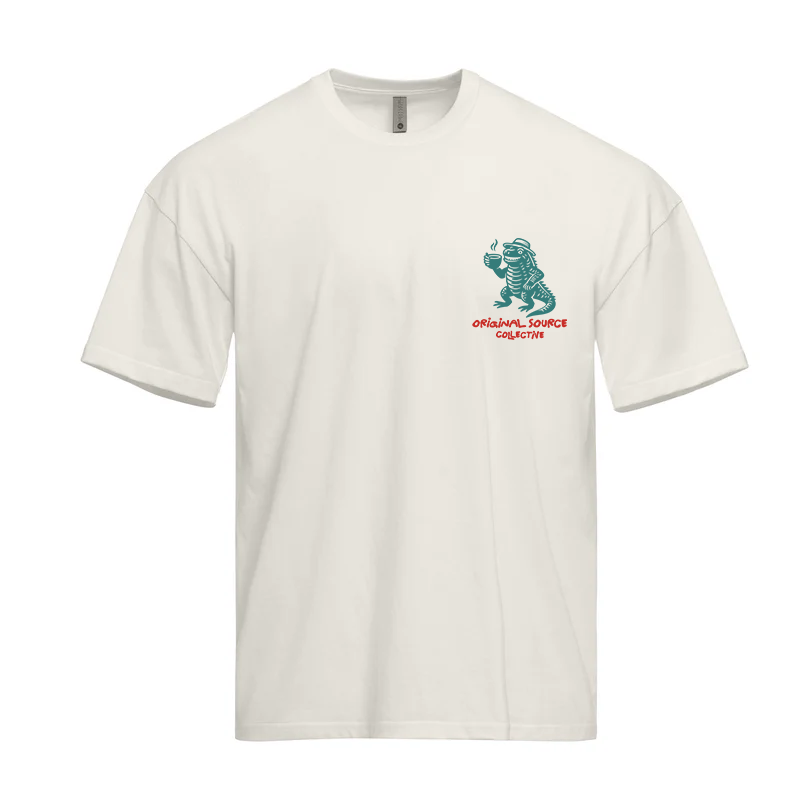 White t-shirt with an Original Source Collective graphic design on the chest against a white background