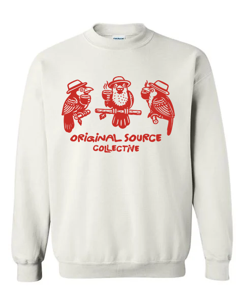 White sweatshirt with red graphic design and 'Original Source Collective' text on a white background